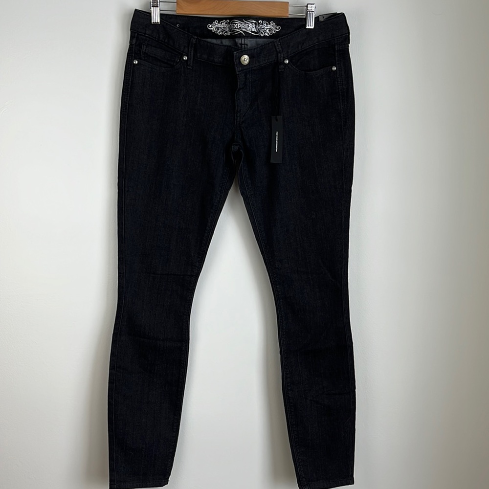 NWT Express women’s black jean leggings. Size 12